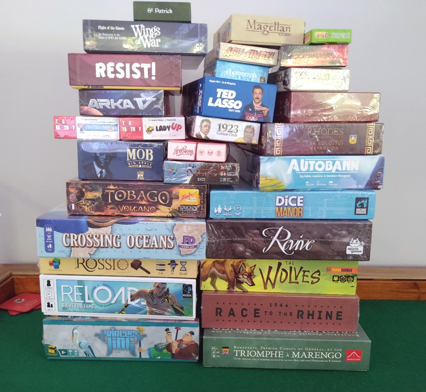 a pile of games from Essen SPIEL 2023